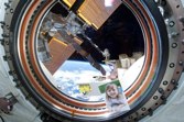 Ryan in the Japanese Experiment Module &ndash; rear window, ISS